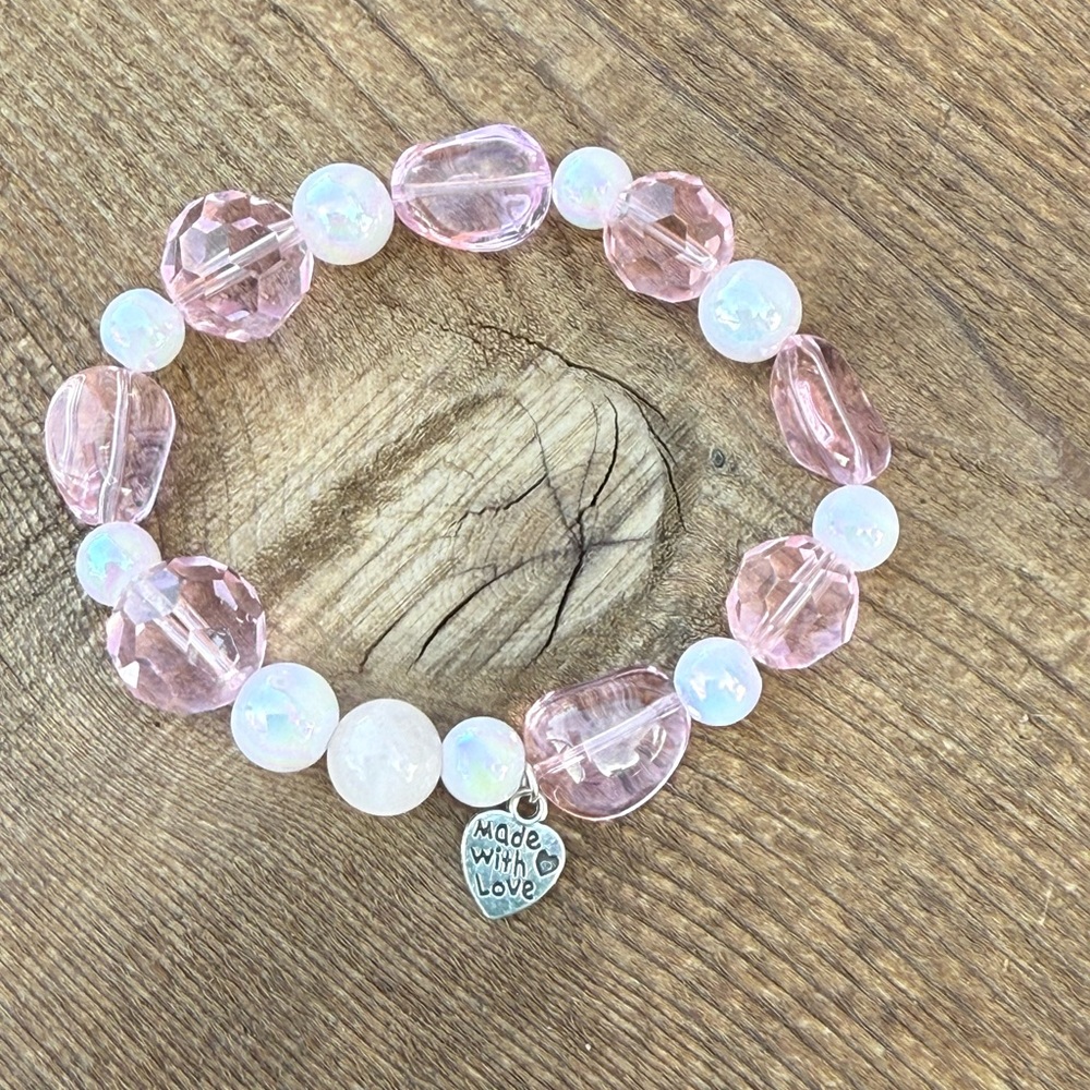 Pink glass beads with a focal bead of rose quartz and White Beaded Bracelet